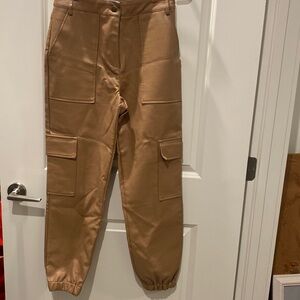 Tan colored fake leather pants never worn